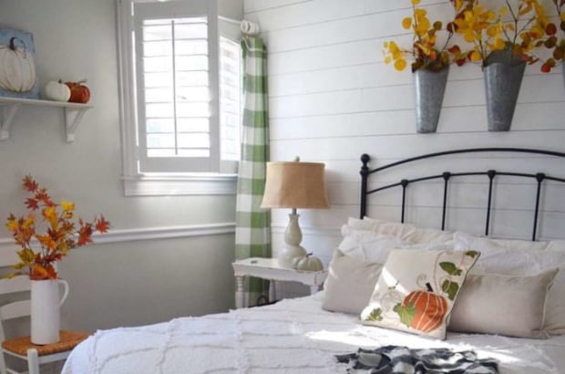 Reclaimed wood in room with plantation shutters